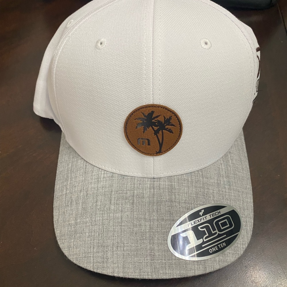 Travis Mathew white logo hat